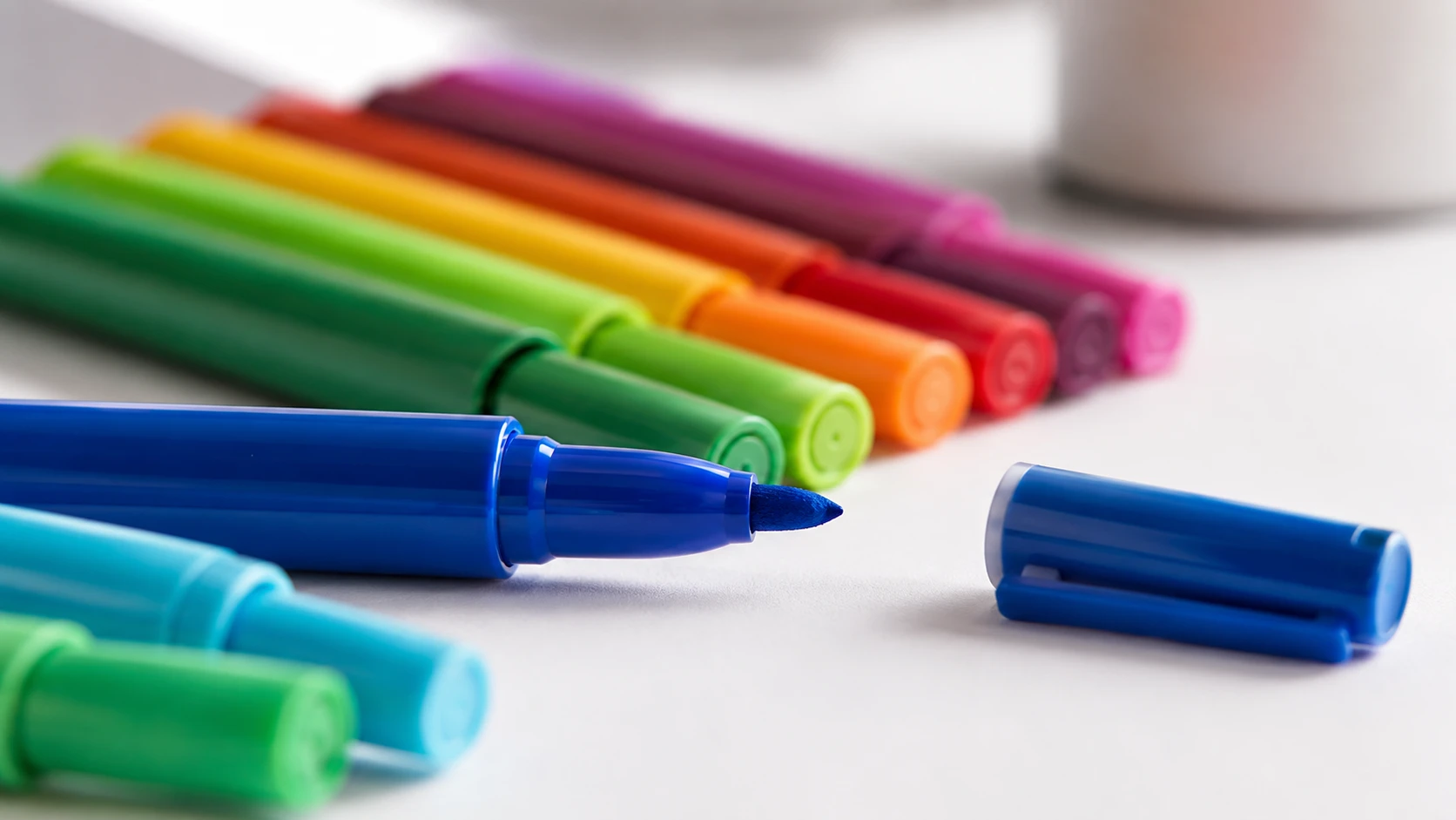 Marker pen quality control — fresh ink-saturated marker nib under professional factory inspection lighting