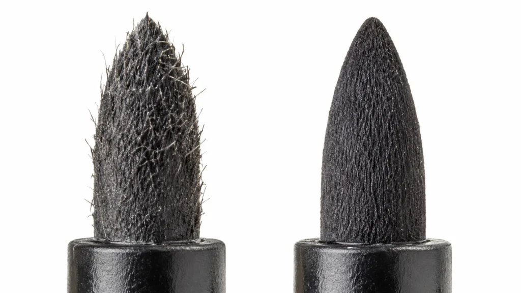 Worn frayed pen tip versus new nib comparison