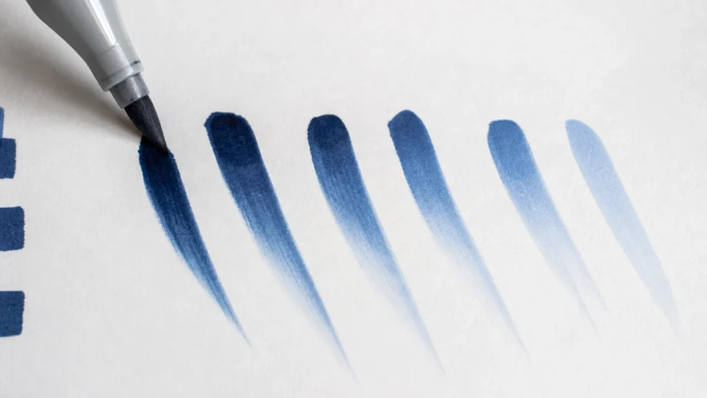 Brush tip alcohol marker feathering strokes on paper