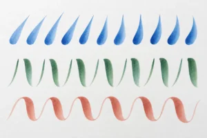Tapered, thin-to-thick and curved brush stroke exercises on white paper